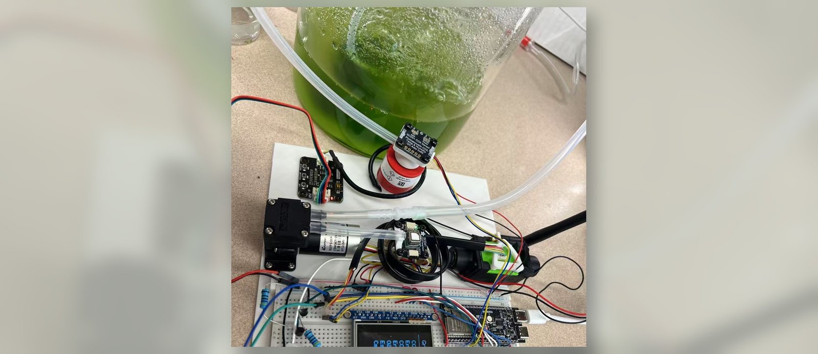 GRO-BOT algae bioreactor prototype with reactor jar and sensors visible